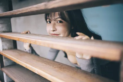 Woman Peering Through Wooden Shelves - free people & portraits wallpaper 4000×2658