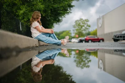 Girl Sitting by Puddle with Reflection - free people & portraits wallpaper 6144×4096