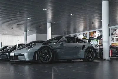 Porsche 911 GT3 RS in Modern Showroom - free cars & vehicles wallpaper 4818×3212