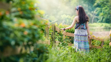 Girl in Colorful Dress Walking Along Garden Fence - free people & portraits wallpaper 7680×4320