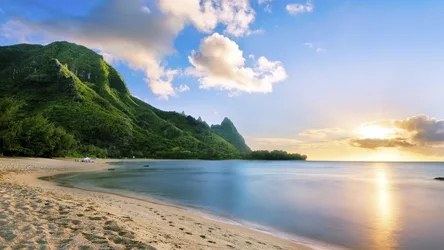 Tropical Beach Cove With Lush Green Mountains - free landscapes wallpaper 1920×1080