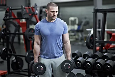 Man Holding Dumbbells in Modern Gym Setting - free people & portraits wallpaper 3000×2000