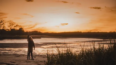 Surfer in Wetsuit at Sunset by Coastal Marsh - free people & portraits wallpaper 6144×3456