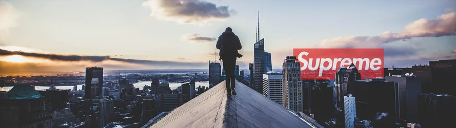 Urban Explorer Standing Atop City Skyline - free photography wallpaper 3840×1080