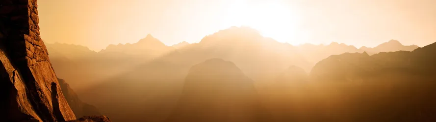 Golden Mountain Sunrise Through Misty Peaks - free landscapes wallpaper 3840×1080