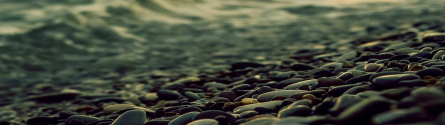 Smooth Stones By The Water - free nature wallpaper 3840×1080