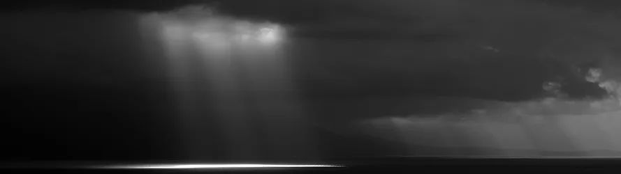 Stormy Seascape with Crepuscular Rays - free dark wallpaper 3840×1080
