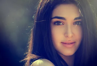 Woman With Dark Hair in Golden Sunlight - free wallpaper 2046×1393