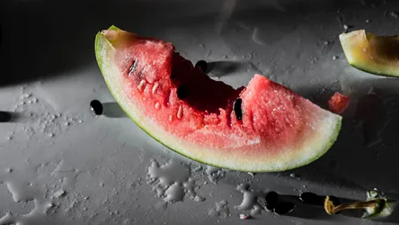 Fresh Watermelon Slice with Water Droplets on Gray Surface - free wallpaper 3840×2160