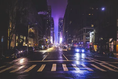 Nighttime Urban Street With Purple Sky and Crosswalk - free wallpaper 7680×5123