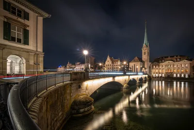 Zurich Old Town at Night with Illuminated Bridge and Church - free wallpaper 4898×3265