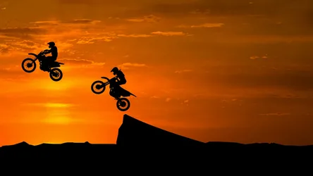 Dirt Bike Stunts at Golden Sunset - free sports wallpaper 2560×1440