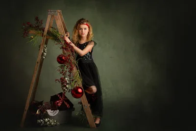 Young Woman Decorating Ladder with Holiday Garland - free people & portraits wallpaper 2048×1365