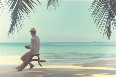 Man Reading Book on Tropical Beach by Ocean - free people & portraits wallpaper 3000×1999