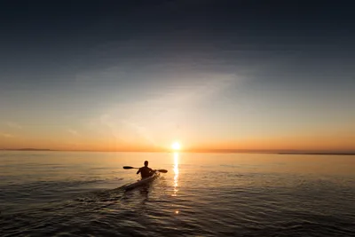 Man in Kayak at Sunset Over Calm Water - free people & portraits wallpaper 5472×3648