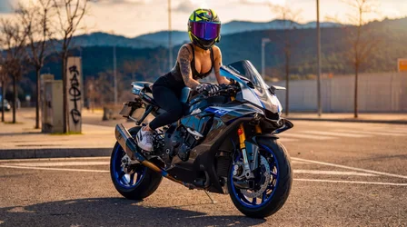 AI Art Girl on Blue and Black Sport Bike on Mountain Road - free wallpaper 7680×4287