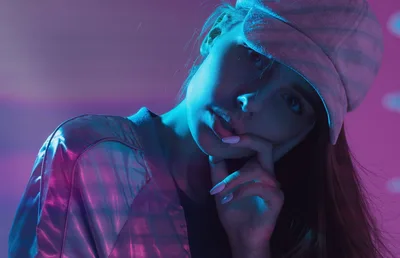Woman in Hat with Finger to Lips in Neon Purple and Blue Lighting - free people & portraits wallpaper 7680×4938