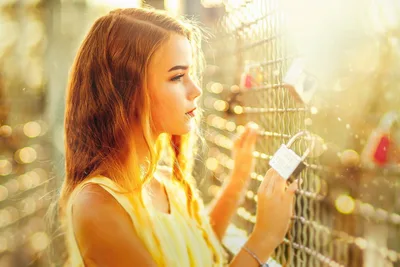 Girl At Fence With Padlocks In Golden Sunlight - free people & portraits wallpaper 7680×5121