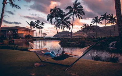 Hammock by Lake at Sunset with Mountains and Palm Trees - free people & portraits wallpaper 7680×4800