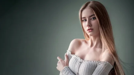 Girl with Blonde Long Hair in Off-Shoulder Blouse Against Green Background - free wallpaper 3840×2160