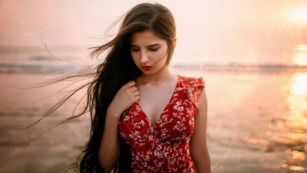 Brunette Model in Red Floral Dress at Sunset Beach - free wallpaper 7680×4321